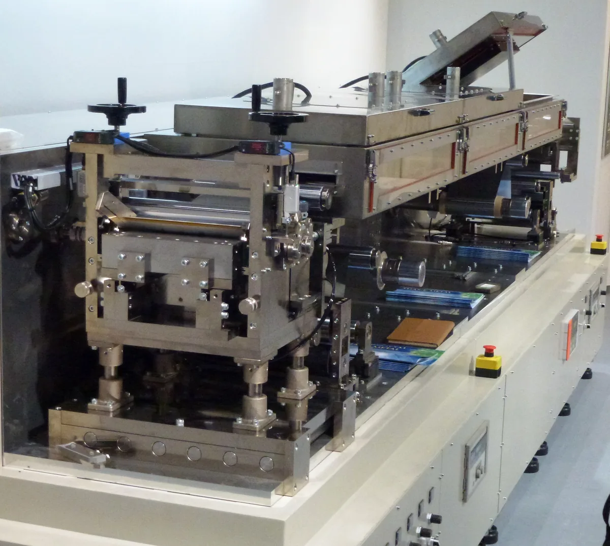 Battery electrode coating equipment in a research lab, representative of the pilot-line hardware Solid Power uses to scale its sulfide electrolyte production